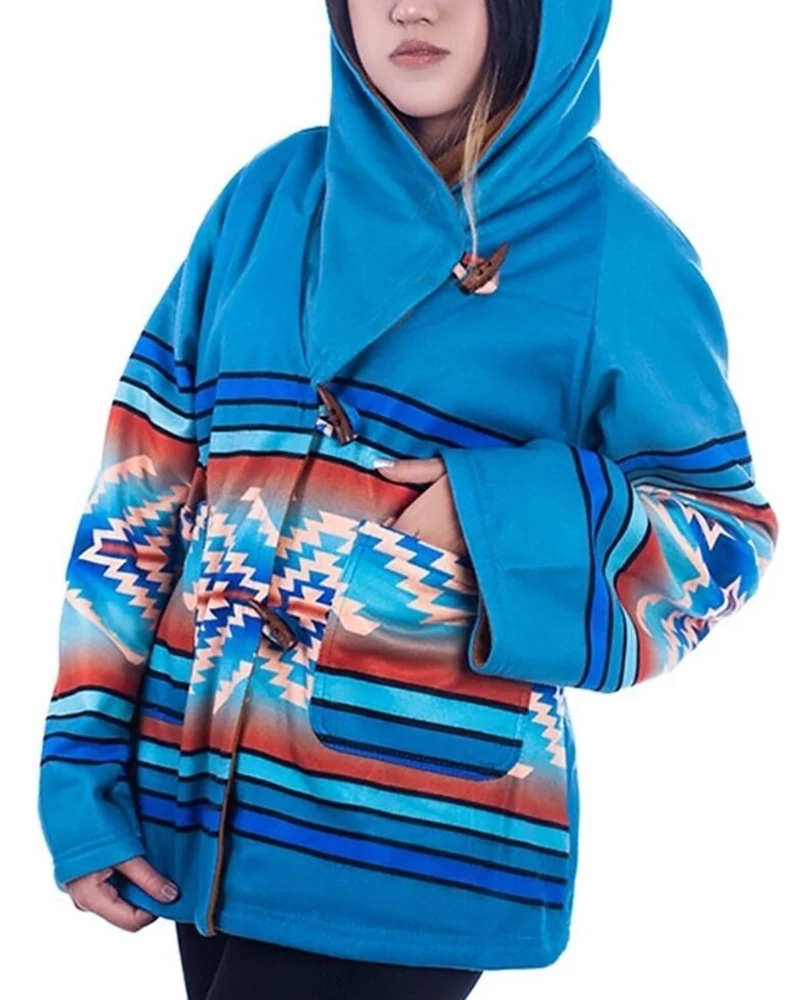 Yellowstone Fashion – Beth Dutton’s Bold Blue Poncho Coat